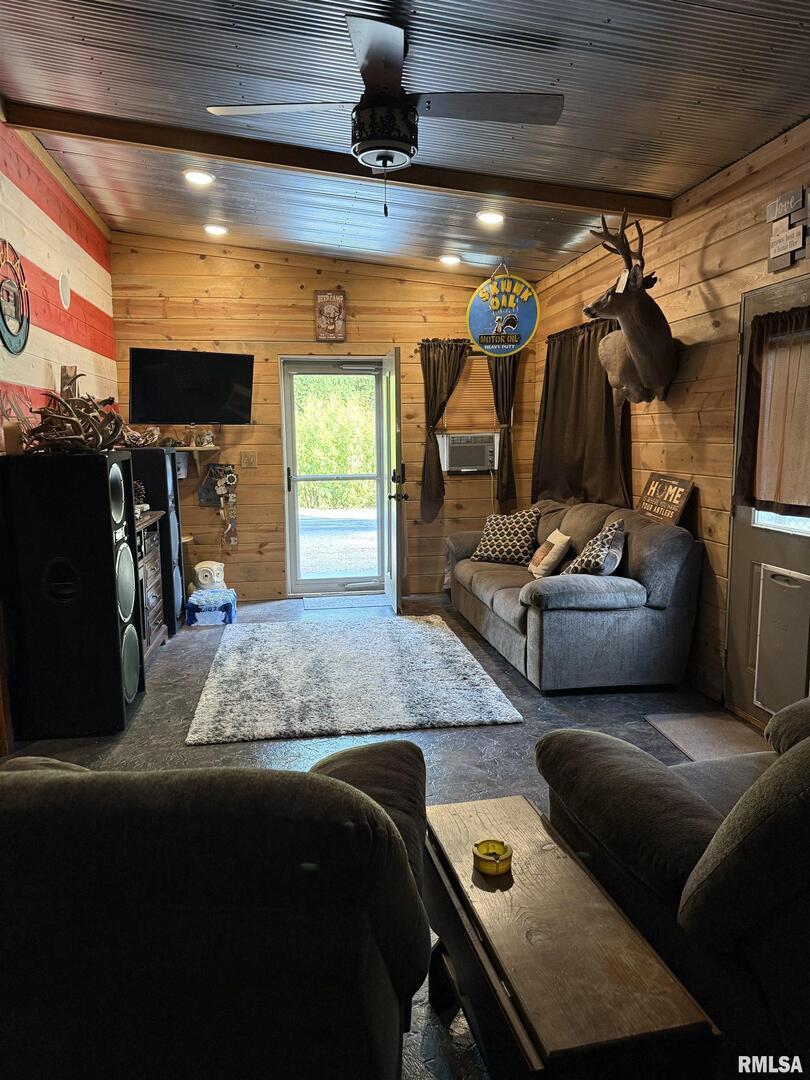 5435 Hickory Ridge Road Pomona, IL 62975 - Photo 24 of 67 a living room with furniture and a flat screen tv