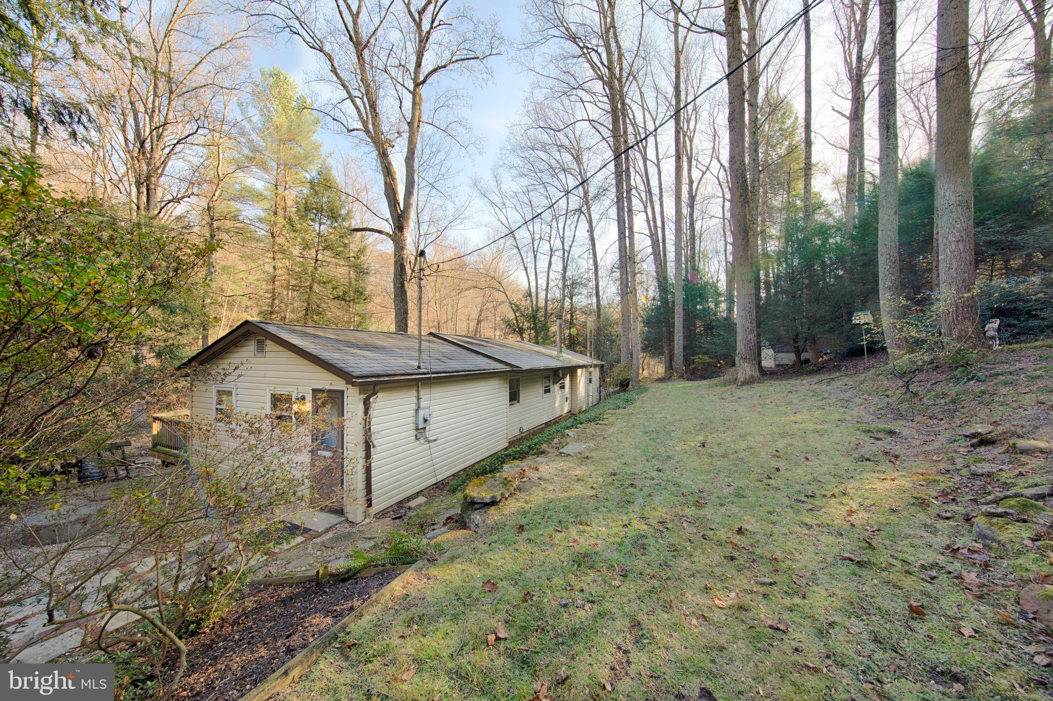 1014 Aubel Road Delta, PA 17314 - Photo 1 of 32 WELCOME HOME TO YOUR CABIN IN THE WOODS !!