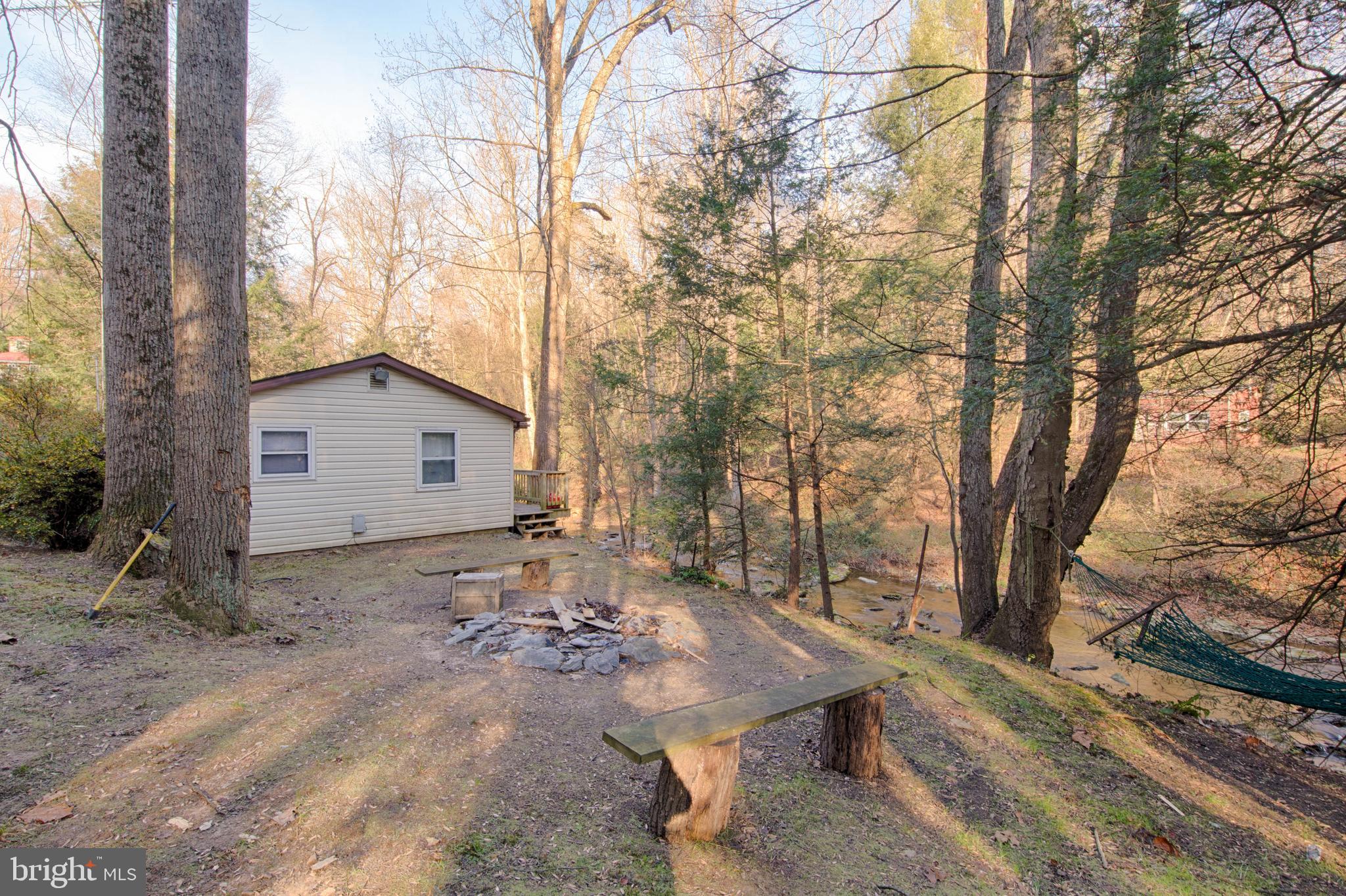 1014 Aubel Road Delta, PA 17314 - Photo 4 of 32 CAMPFIRE PIT IN THE REAR YARD !!