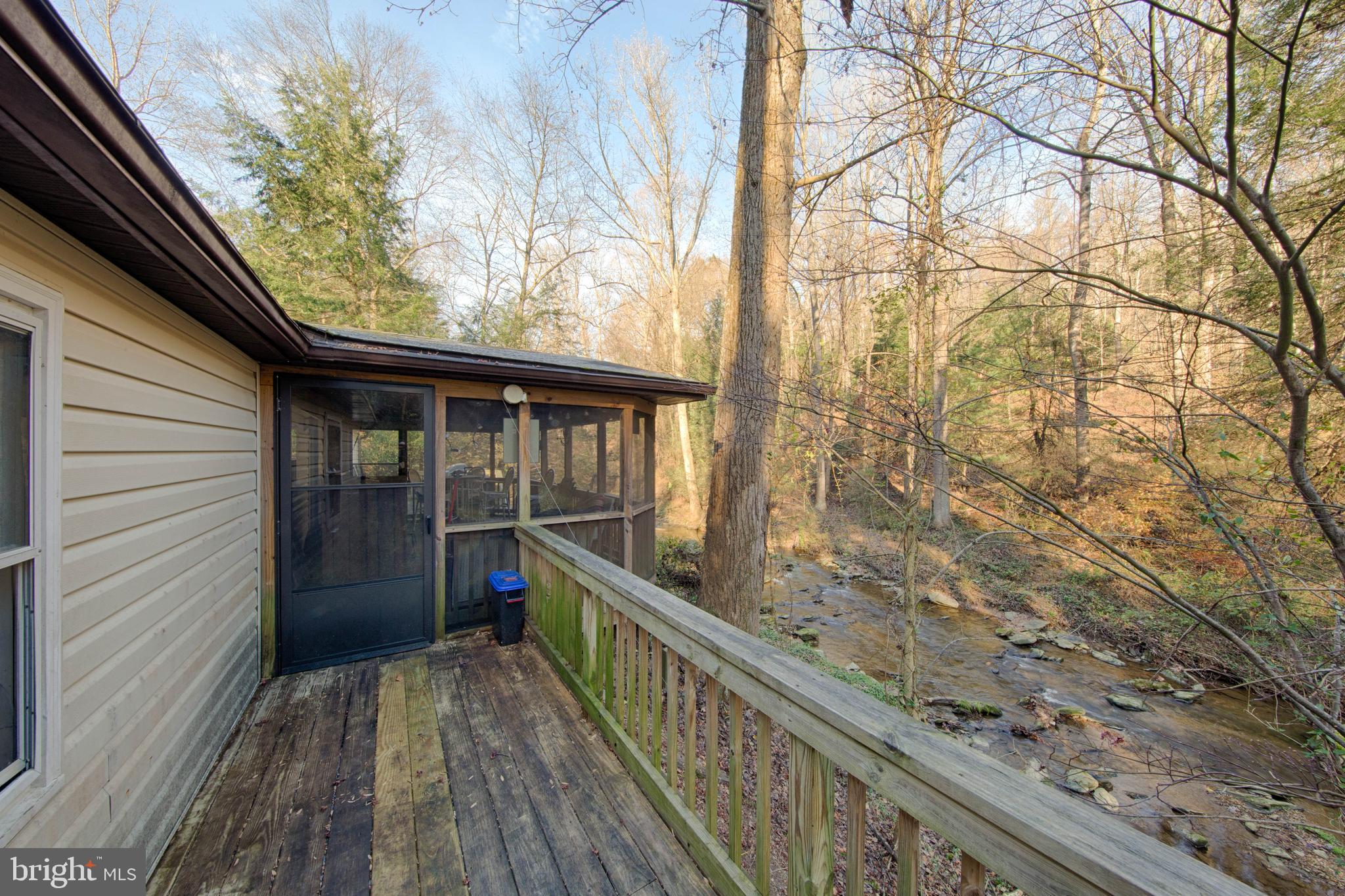 1014 Aubel Road Delta, PA 17314 - Photo 5 of 32 REAR DECK OVERLOOKING THE CREEK !!