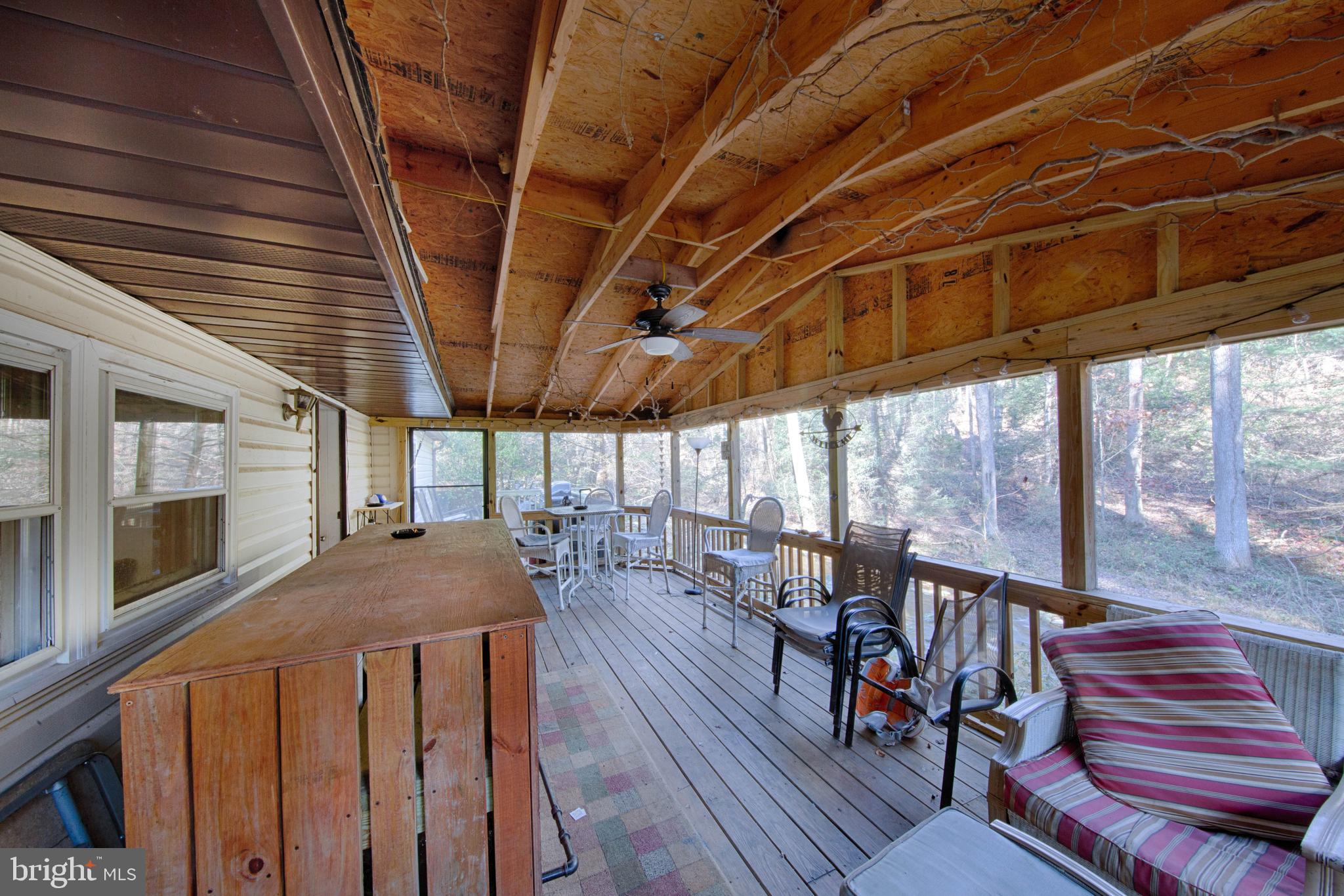 1014 Aubel Road Delta, PA 17314 - Photo 6 of 32 ENJOY THE VIEWS ON THE SCREENED IN REAR PORCH !!