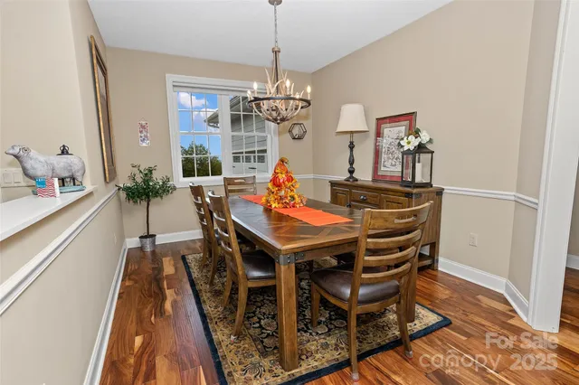a kitchen with granite countertop a sink and cabinets