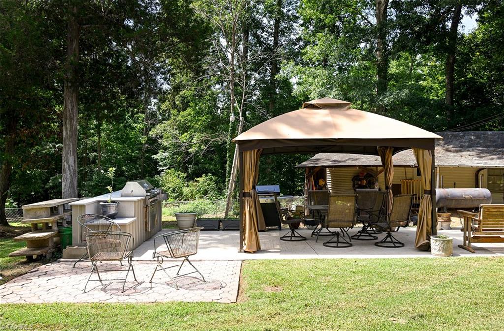 14 Paul Beck Road Lexington, NC 27292 - Photo 13 of 38 Outdoor Patio area. Gazebo does NOT stay. Can be purchased.