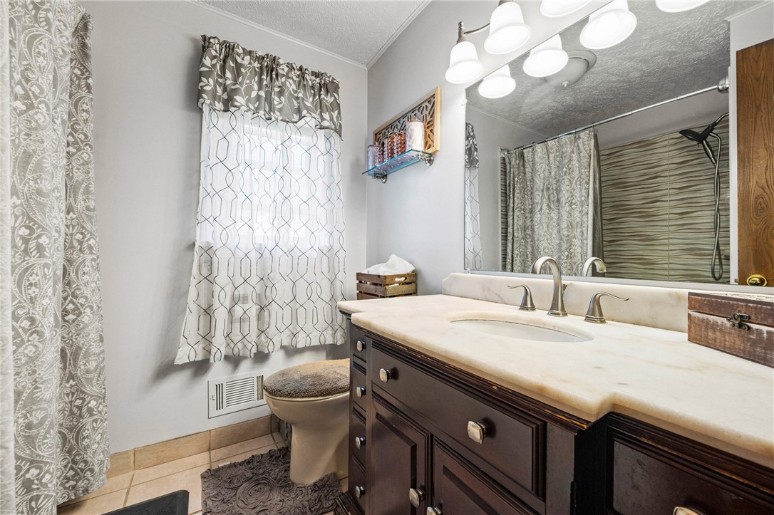 1140 Willits Road Ontario, NY 14519 - Photo 17 of 50 Main bath- solid surface vanity top.