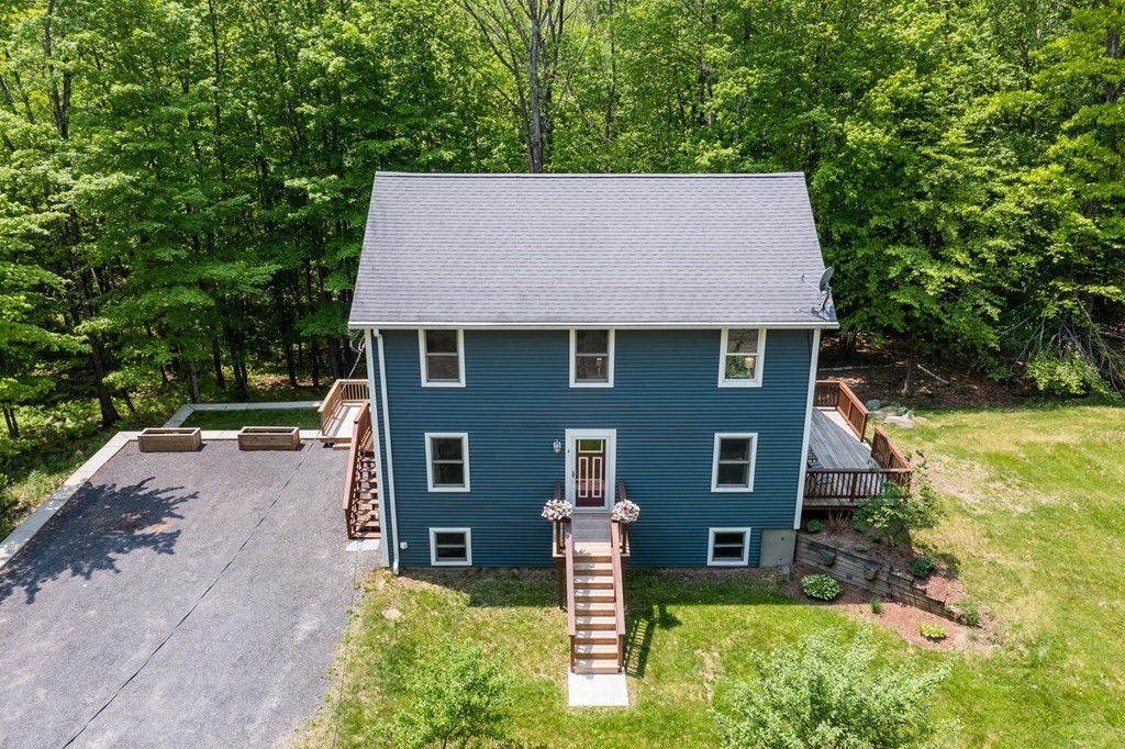 4 Highland Road Williamsburg, MA 01096 - Photo 2 of 42 front view of a house with a yard