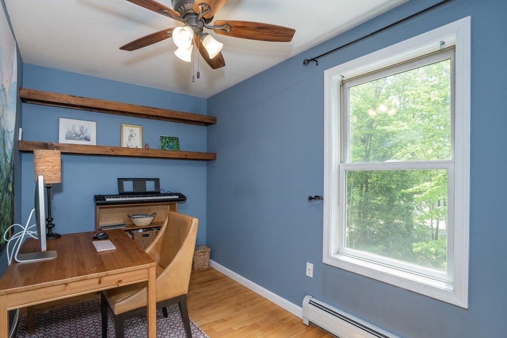 4 Highland Road Williamsburg, MA 01096 - Photo 26 of 42 a room with chandelier fan and windows