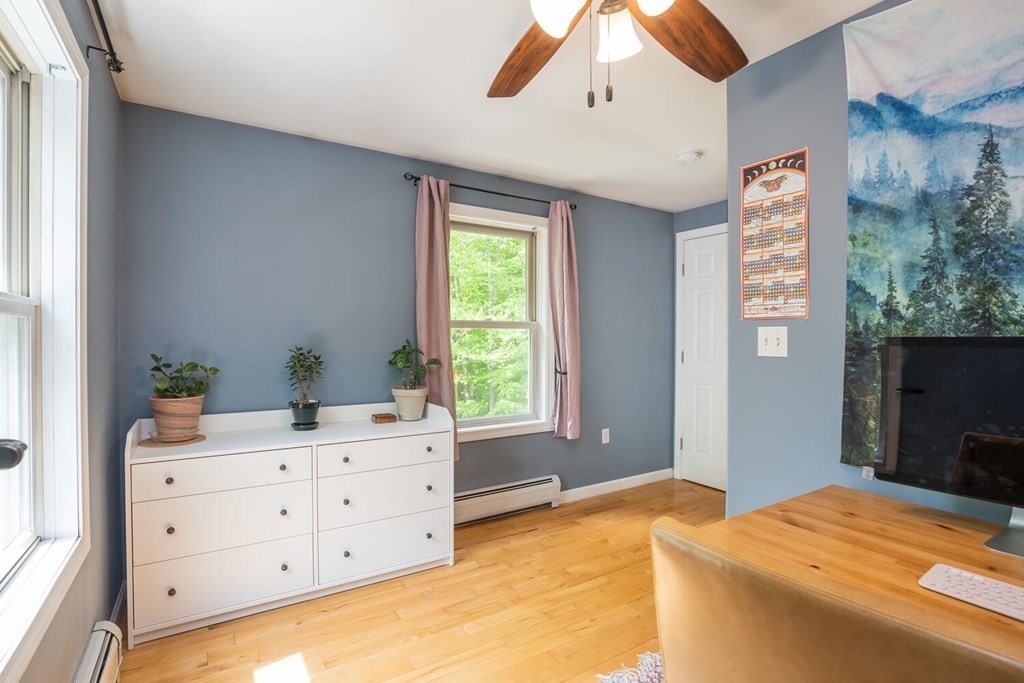 4 Highland Road Williamsburg, MA 01096 - Photo 27 of 42 a bedroom with a bed and a window in it