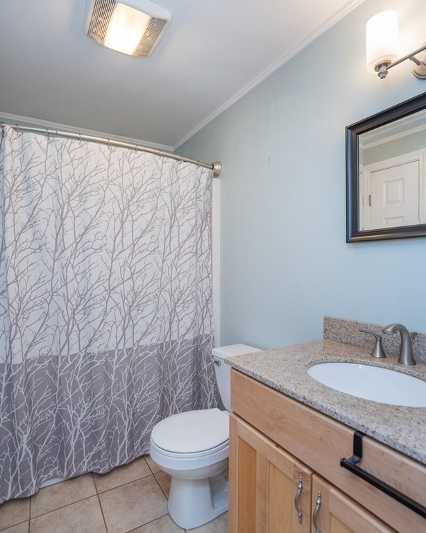 4 Highland Road Williamsburg, MA 01096 - Photo 29 of 42 a bathroom with a granite countertop sink and a mirror