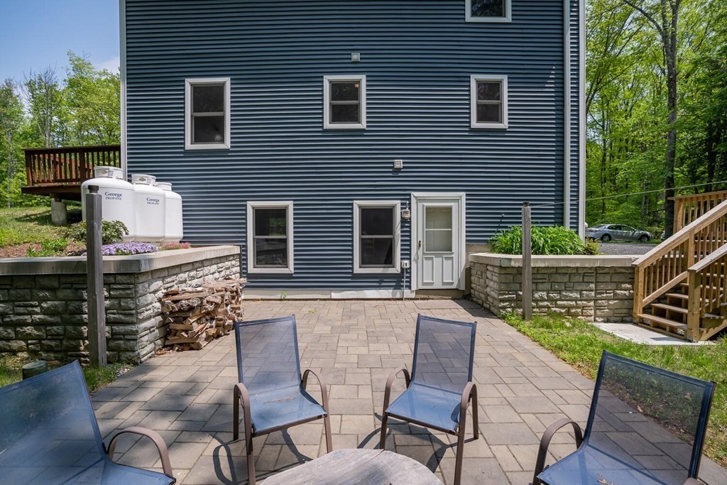 4 Highland Road Williamsburg, MA 01096 - Photo 35 of 42 a view of two chairs and table in the patio