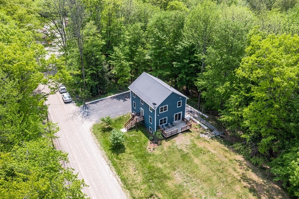 4 Highland Road Williamsburg, MA 01096 - Photo 38 of 42 an aerial view of a house with yard swimming pool and outdoor seating