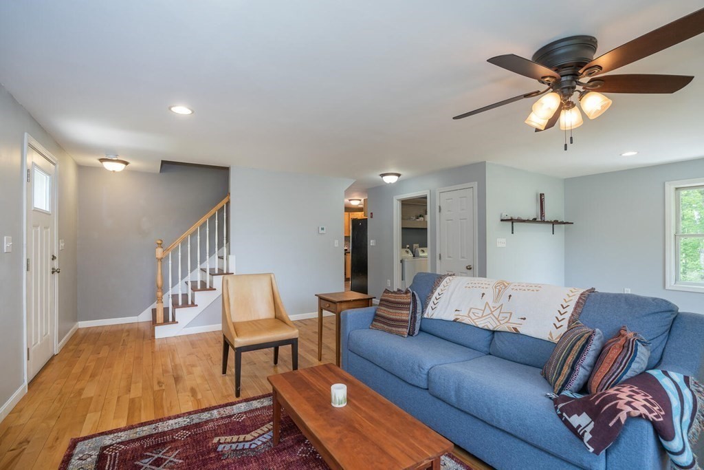 4 Highland Road Williamsburg, MA 01096 - Photo 5 of 42 a living room with furniture and a chandelier