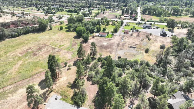 a view of a houses with a yard