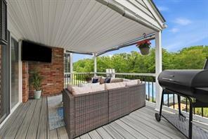 283 Brookwood Road Venetia, PA 15367 - Photo 20 of 36 a view of a patio with table and chairs with wooden floor and fence