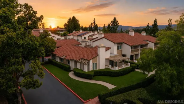 a aerial view of a house with garden