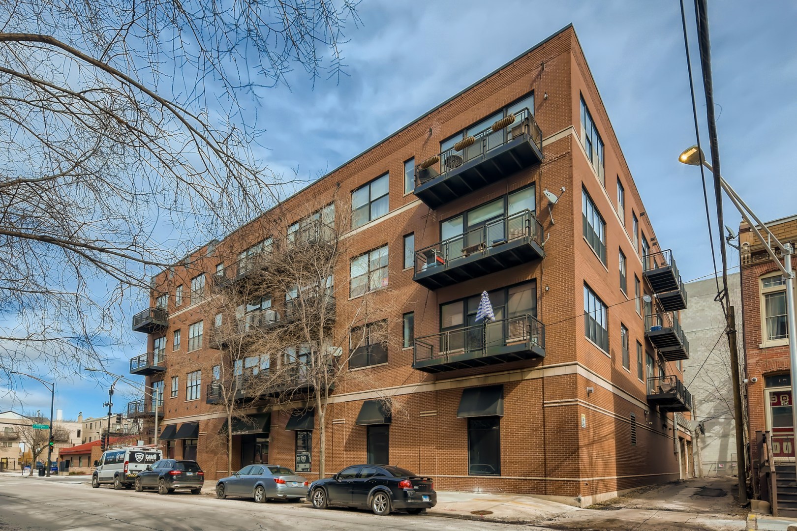 1 South Leavitt Street, Unit 307 Chicago, IL 60612 - Photo 1 of 23 a view of a building and a street