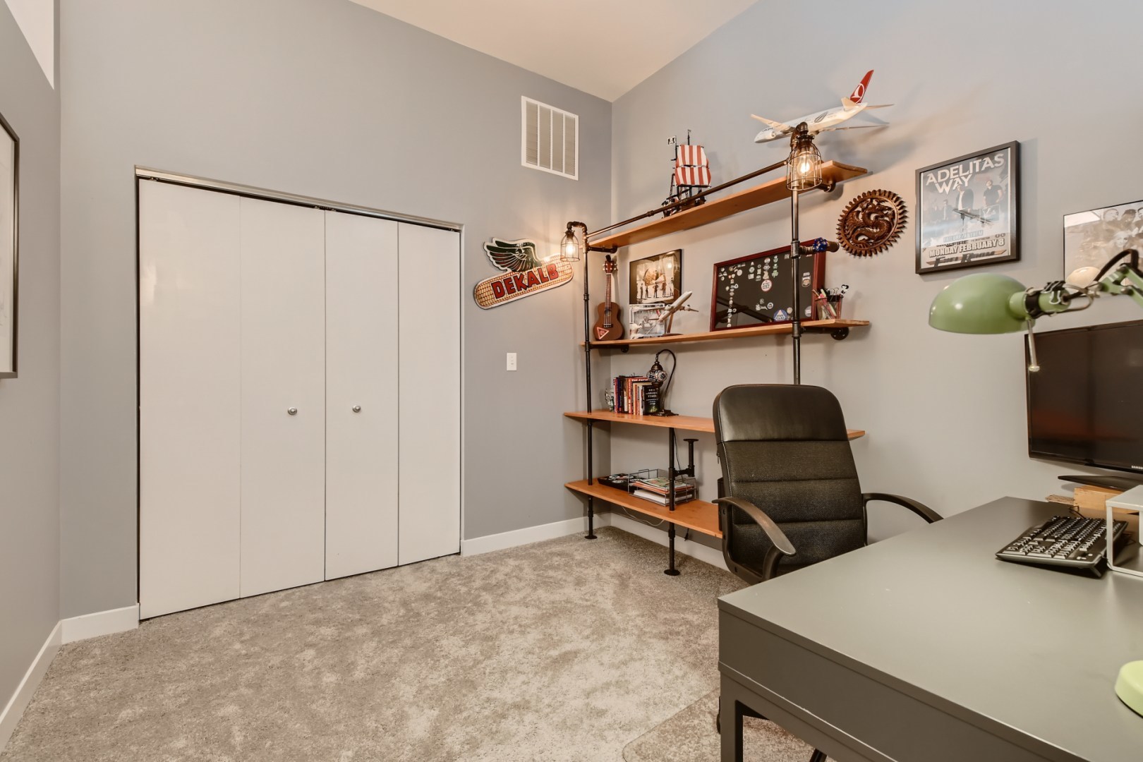 1 South Leavitt Street, Unit 307 Chicago, IL 60612 - Photo 18 of 23 a view of a workspace with furniture and a window