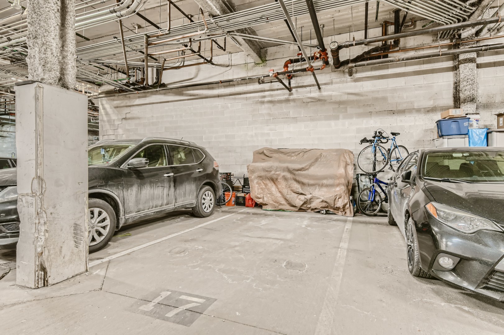 1 South Leavitt Street, Unit 307 Chicago, IL 60612 - Photo 19 of 23 a view of parking garage with cars