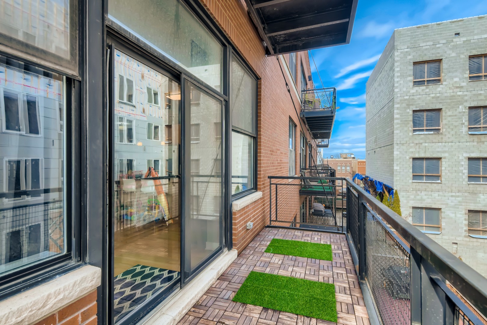 1 South Leavitt Street, Unit 307 Chicago, IL 60612 - Photo 20 of 23 a view of a brick house with a porch