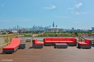 1 South Leavitt Street, Unit 307 Chicago, IL 60612 - Photo 23 of 23 a sitting area with furniture and city view