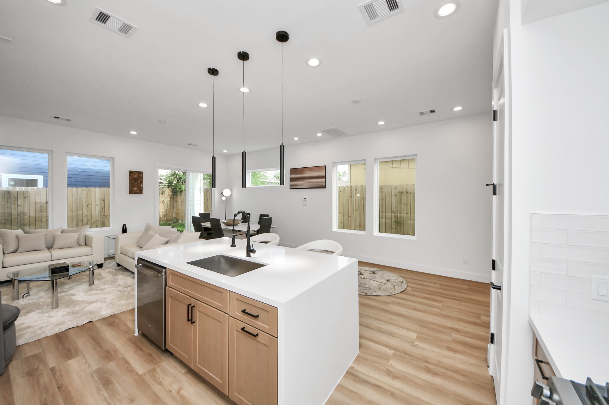 507 Middle Street Houston, TX 77003 - Photo 8 of 48 Discover the perfect blend of style and functionality in this open-concept living space, featuring sleek finishes, abundant natural light, and seamless flow for modern living.