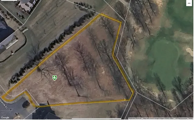 a view of staircase with wooden floor