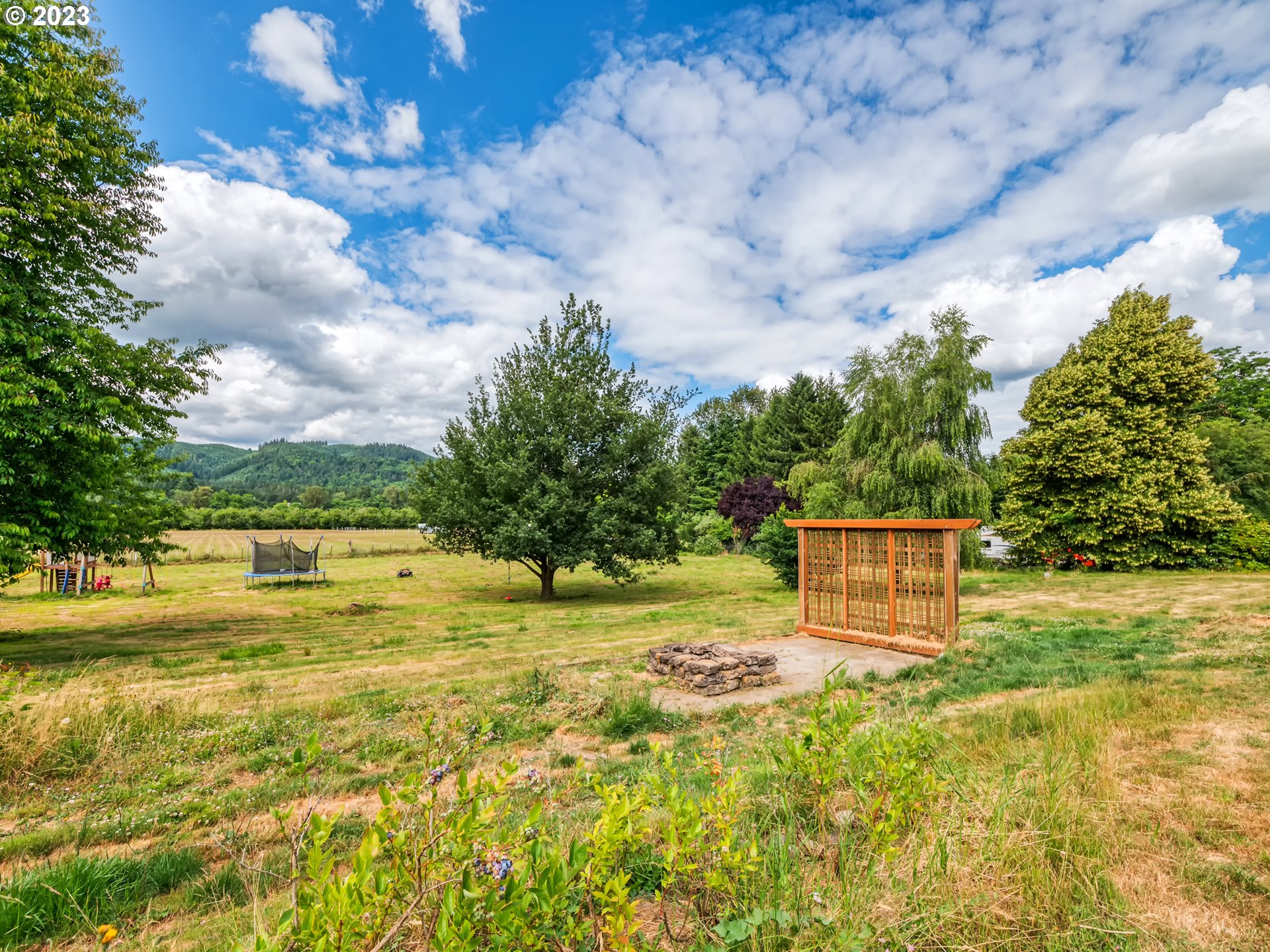 2640 Hayden Bridge Road Springfield, OR 97477 - Photo 27 of 46 a view of a swimming pool with a yard