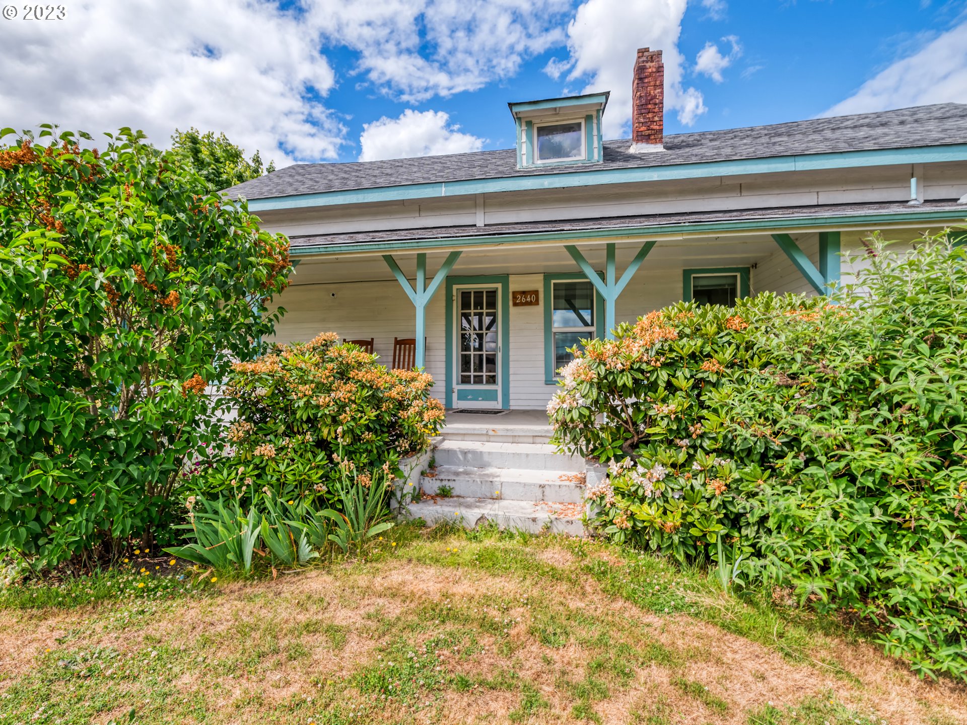 2640 Hayden Bridge Road Springfield, OR 97477 - Photo 3 of 46 front view of a house with potted plants