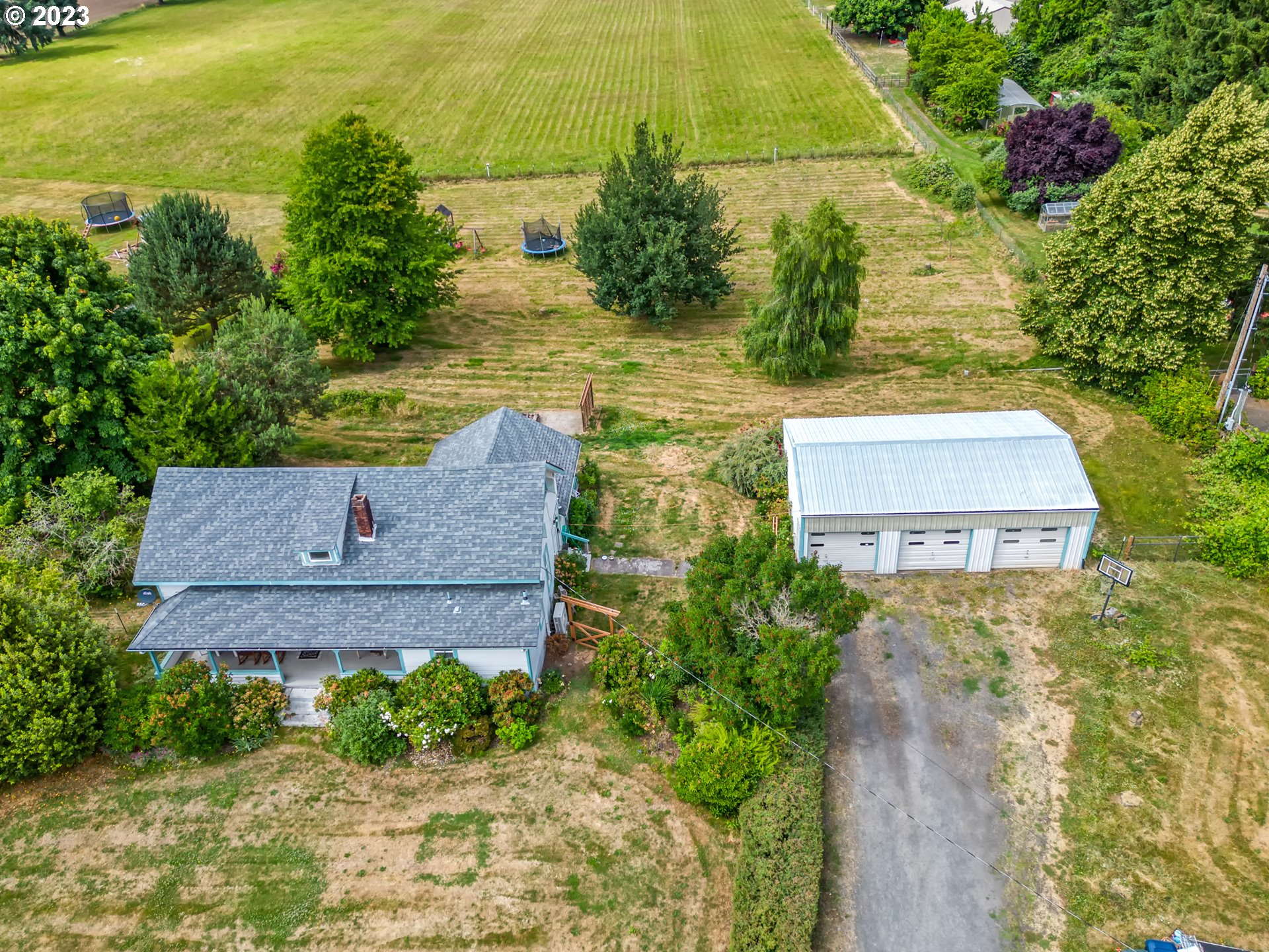 2640 Hayden Bridge Road Springfield, OR 97477 - Photo 46 of 46 an aerial view of a house with a yard