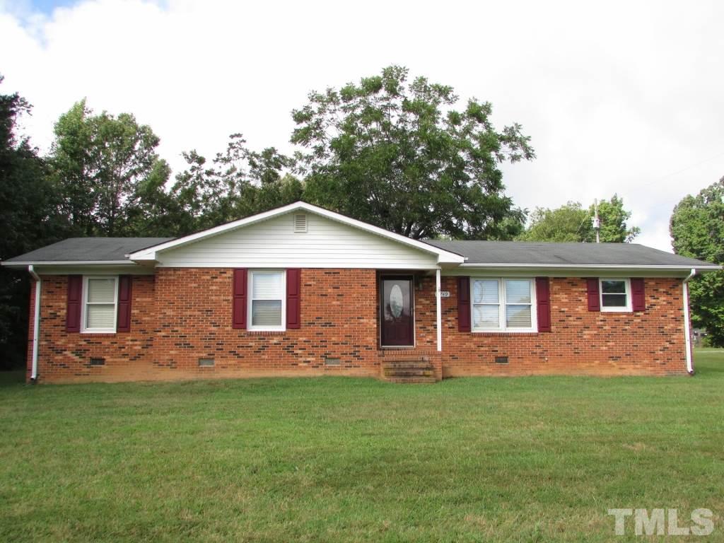 3749 Semora Road Roxboro, NC 27574 - Photo 2 of 24 Nice cozy brick rancher with carport in the Olive Hill Community near the ball park and track