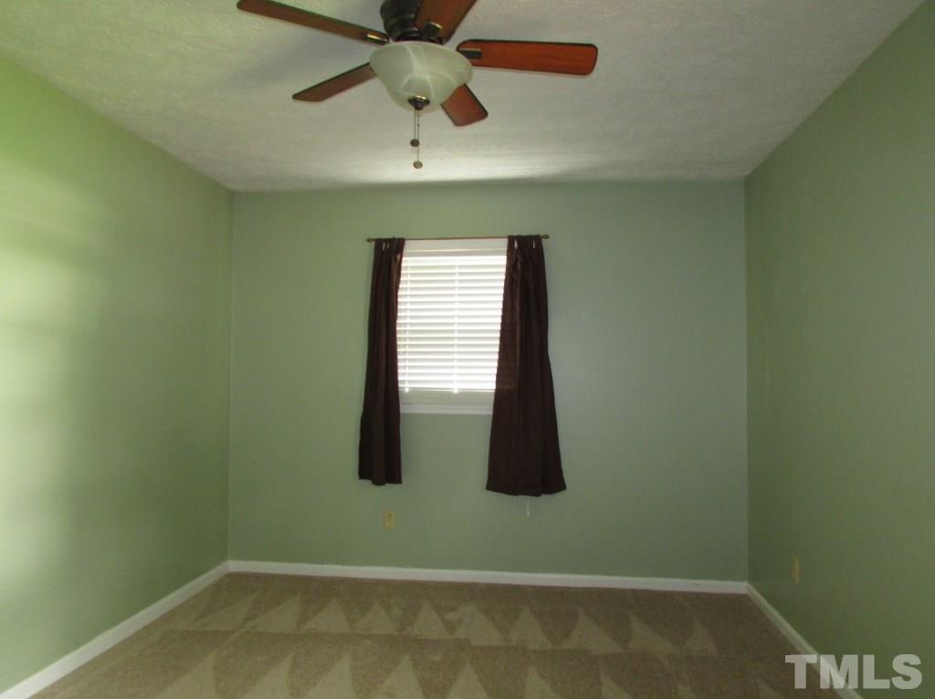 3749 Semora Road Roxboro, NC 27574 - Photo 14 of 24 This bedroom is a nice cool color and also has new carpet