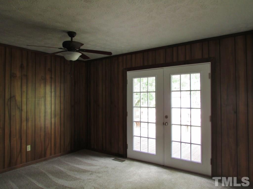 3749 Semora Road Roxboro, NC 27574 - Photo 6 of 24 New carpet and garden door to back deck in the dining area