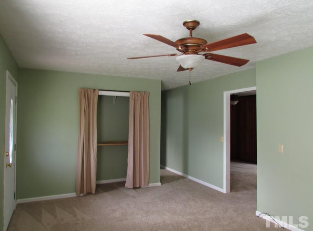 3749 Semora Road Roxboro, NC 27574 - Photo 8 of 24 Seller used what was a coat closet to make an entertainment center