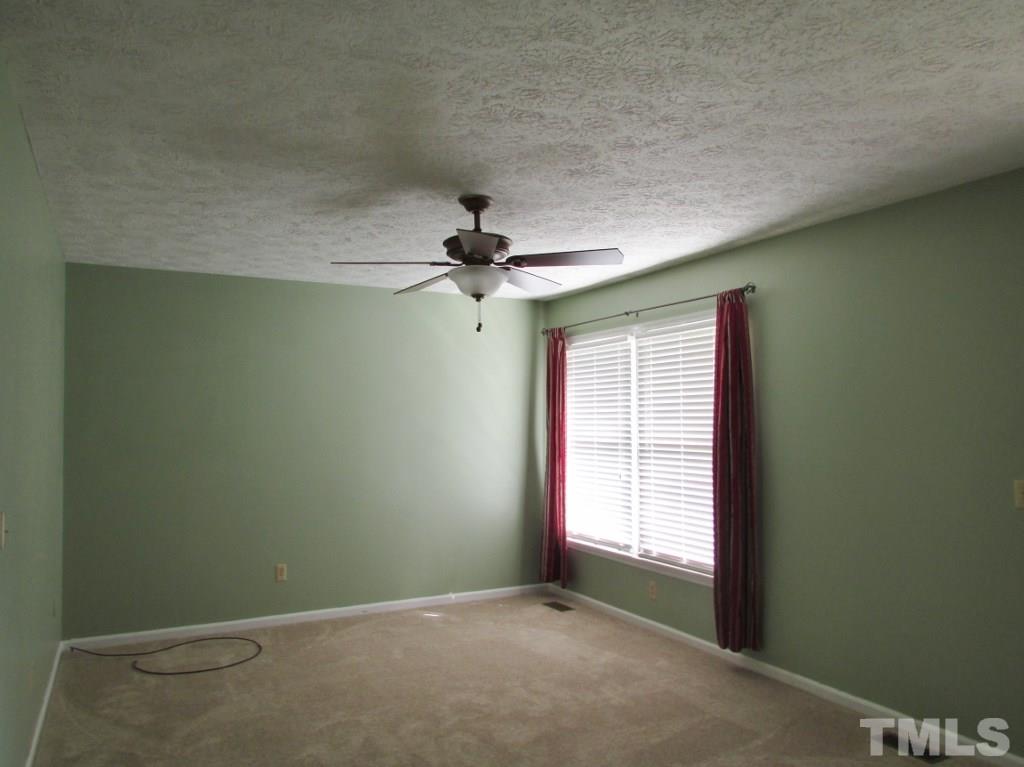 3749 Semora Road Roxboro, NC 27574 - Photo 9 of 24 Fresh new carpet in the living area