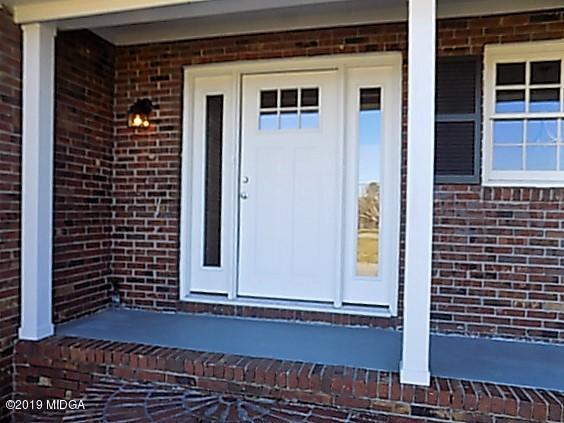 7940 Bethel Church Road Lizella, GA 31052 - Photo 3 of 34 a view of front door of house