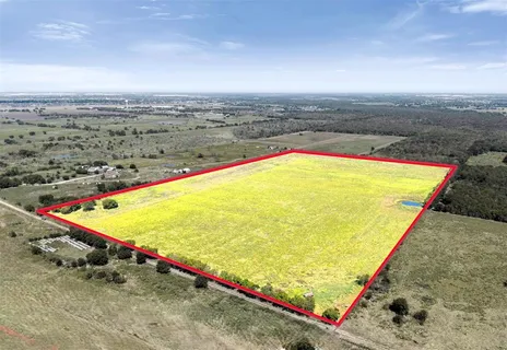 an aerial view of beach and ocean