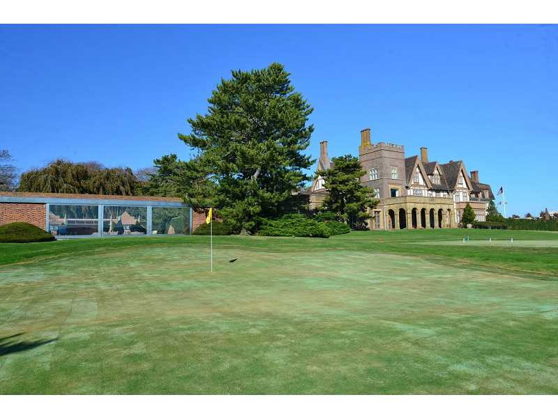 237 Ruggles Avenue Newport, RI 02840 - Photo 23 of 25 Exterior Back. Pool complex, putting green, and main house from ocean side