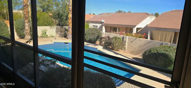 a view of balcony and floor to ceiling windows