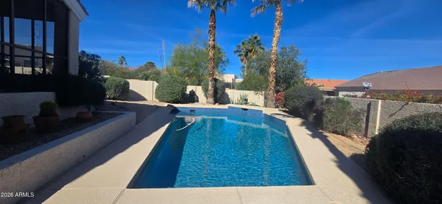 a view of a balcony with chairs