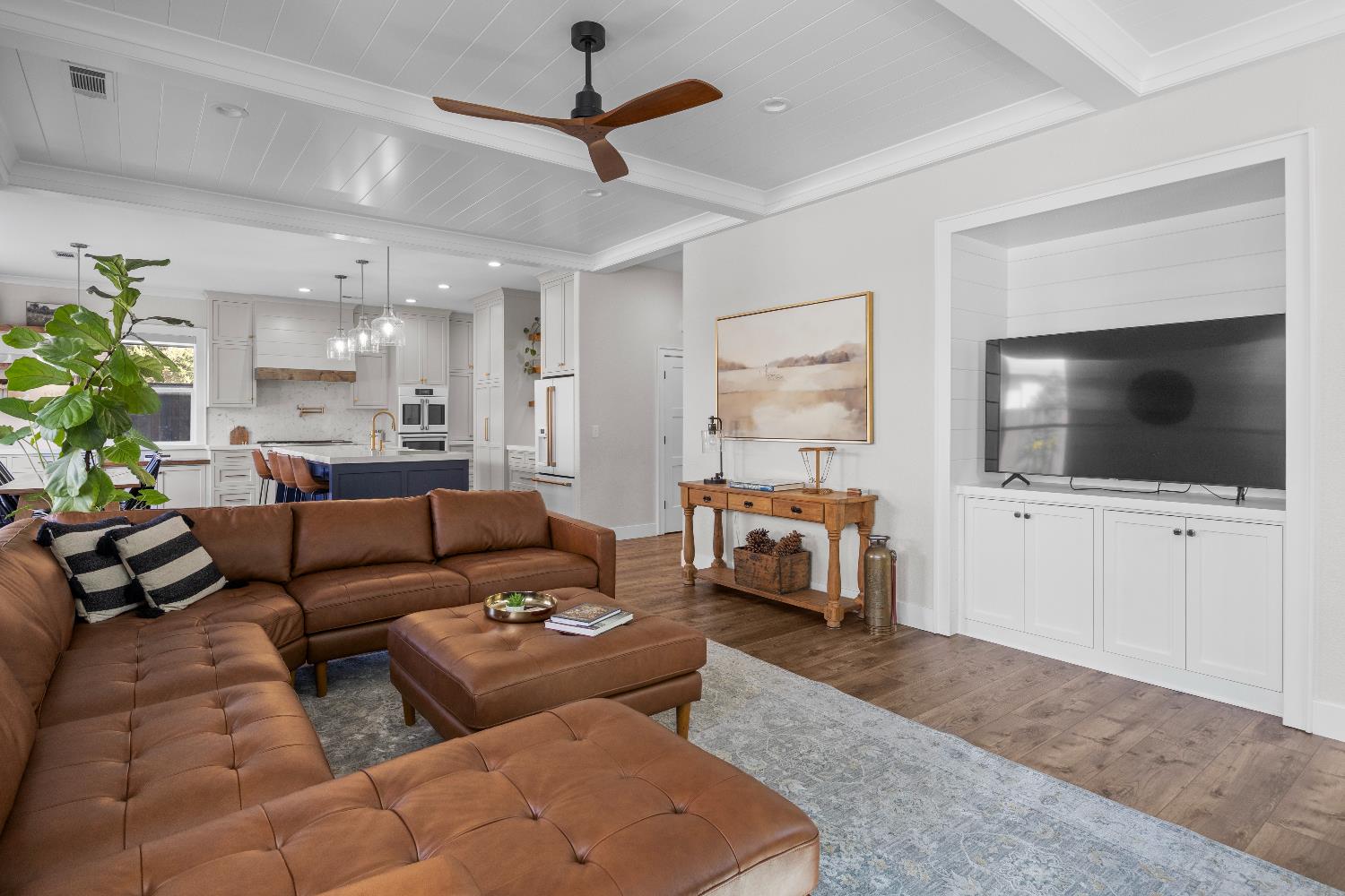 637 Rebekah Court Ripon, CA 95366 - Photo 26 of 69 a living room with furniture and a flat screen tv