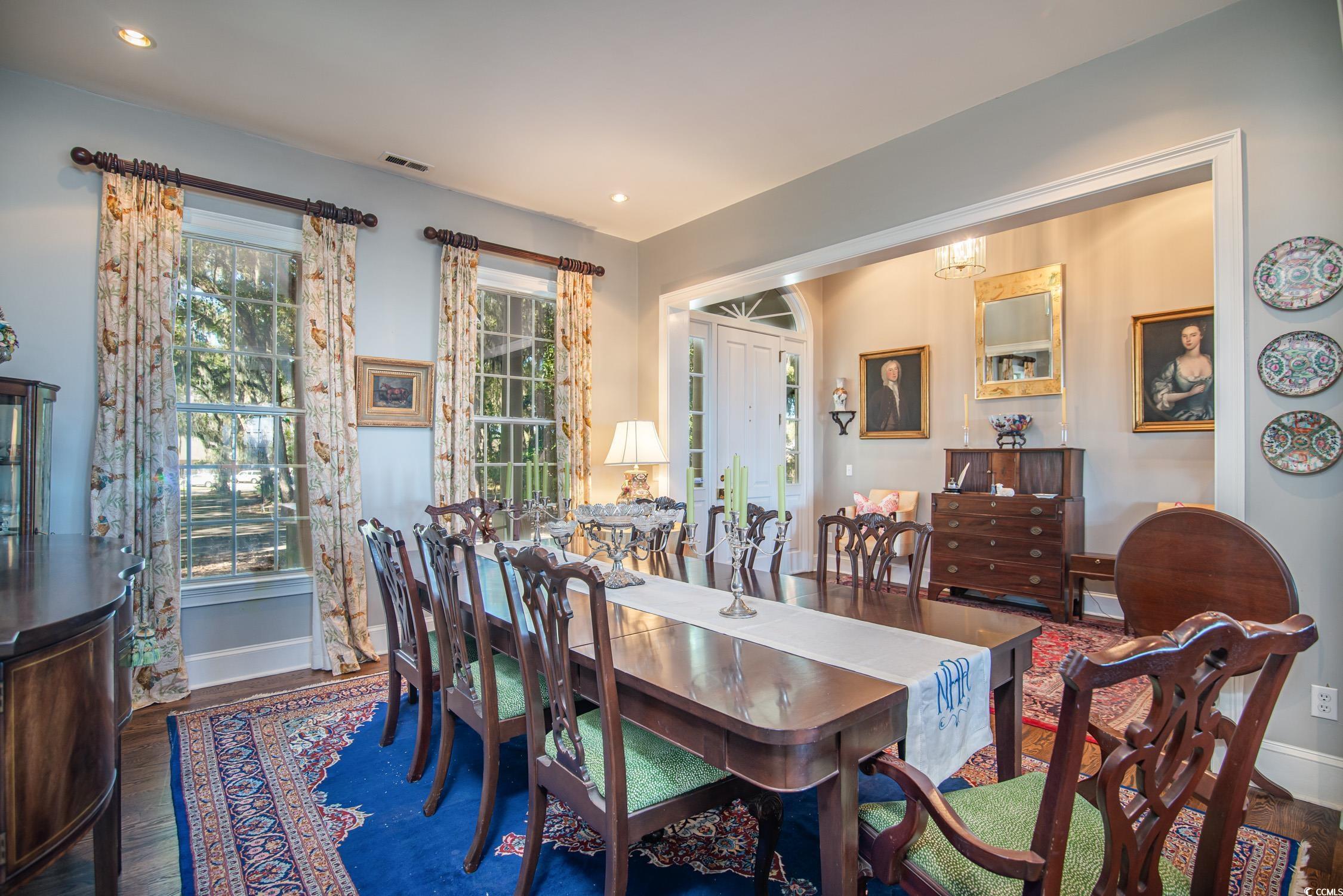 762 Wraggs Ferry Road Georgetown, SC 29440 - Photo 11 of 33 Dining space featuring baseboards, visible vents, wood finished floors, and recessed lighting
