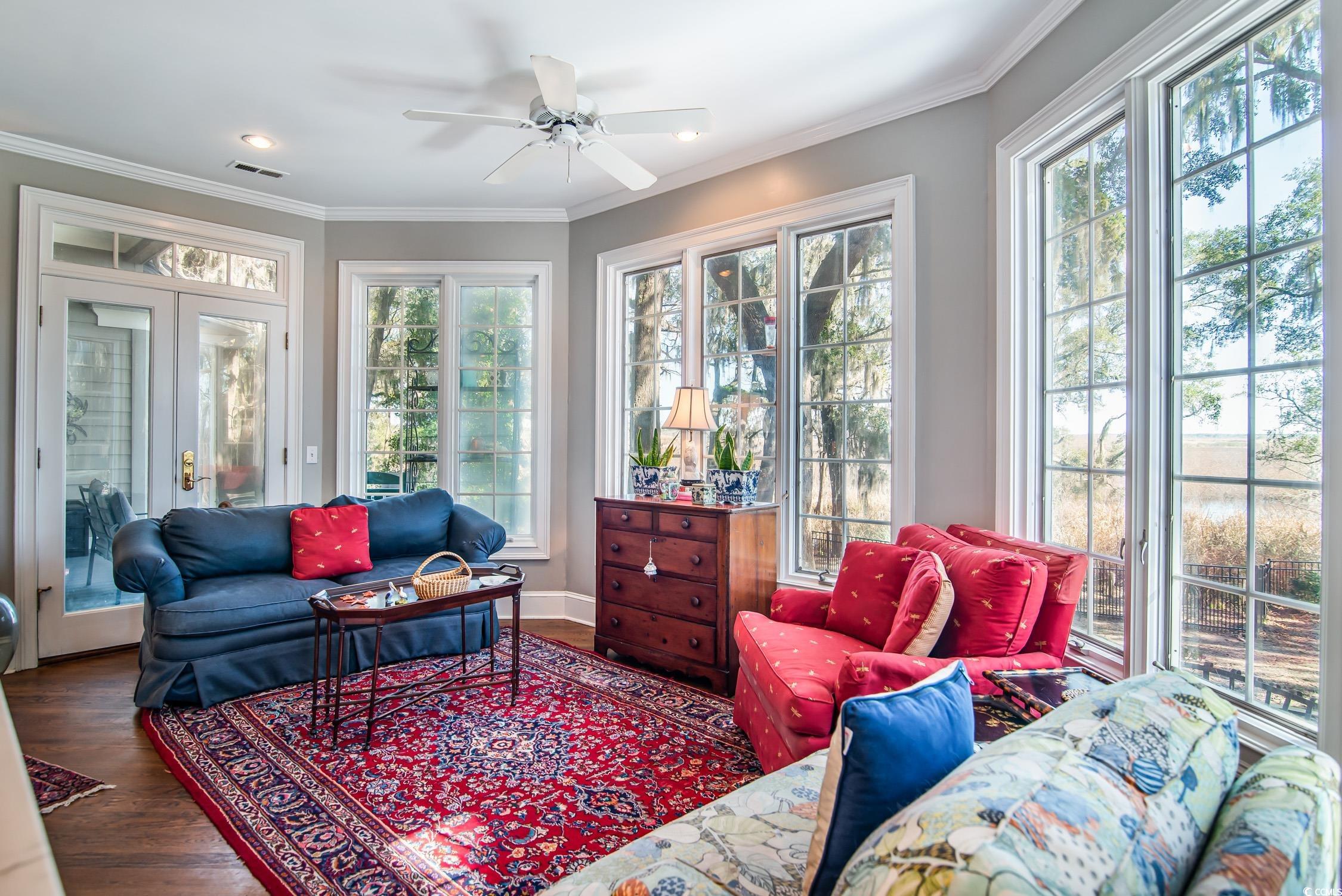762 Wraggs Ferry Road Georgetown, SC 29440 - Photo 16 of 33 Sunroom / solarium with french doors, plenty of natural light, visible vents, and a ceiling fan