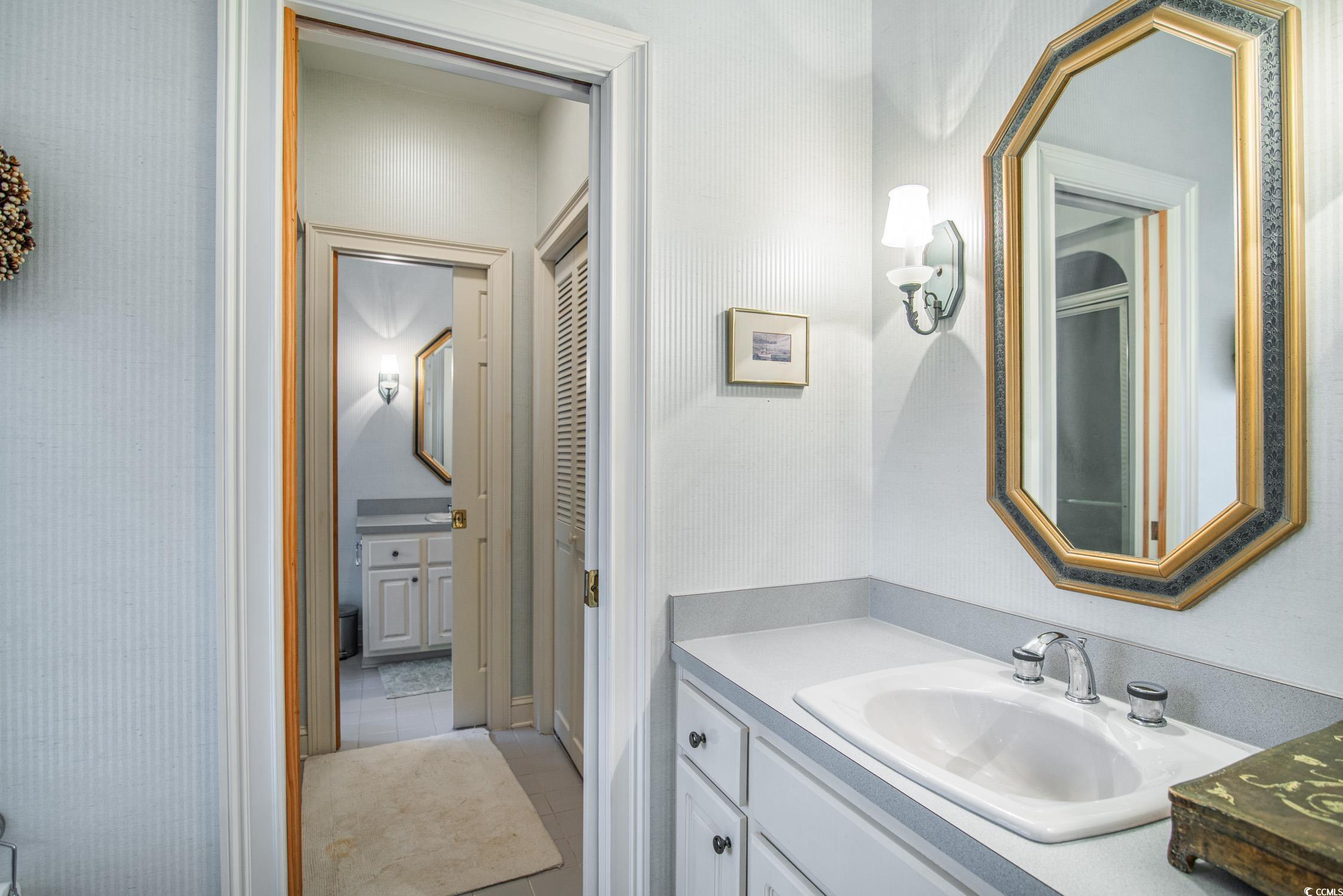 762 Wraggs Ferry Road Georgetown, SC 29440 - Photo 33 of 33 Bathroom with vanity and tile patterned floors