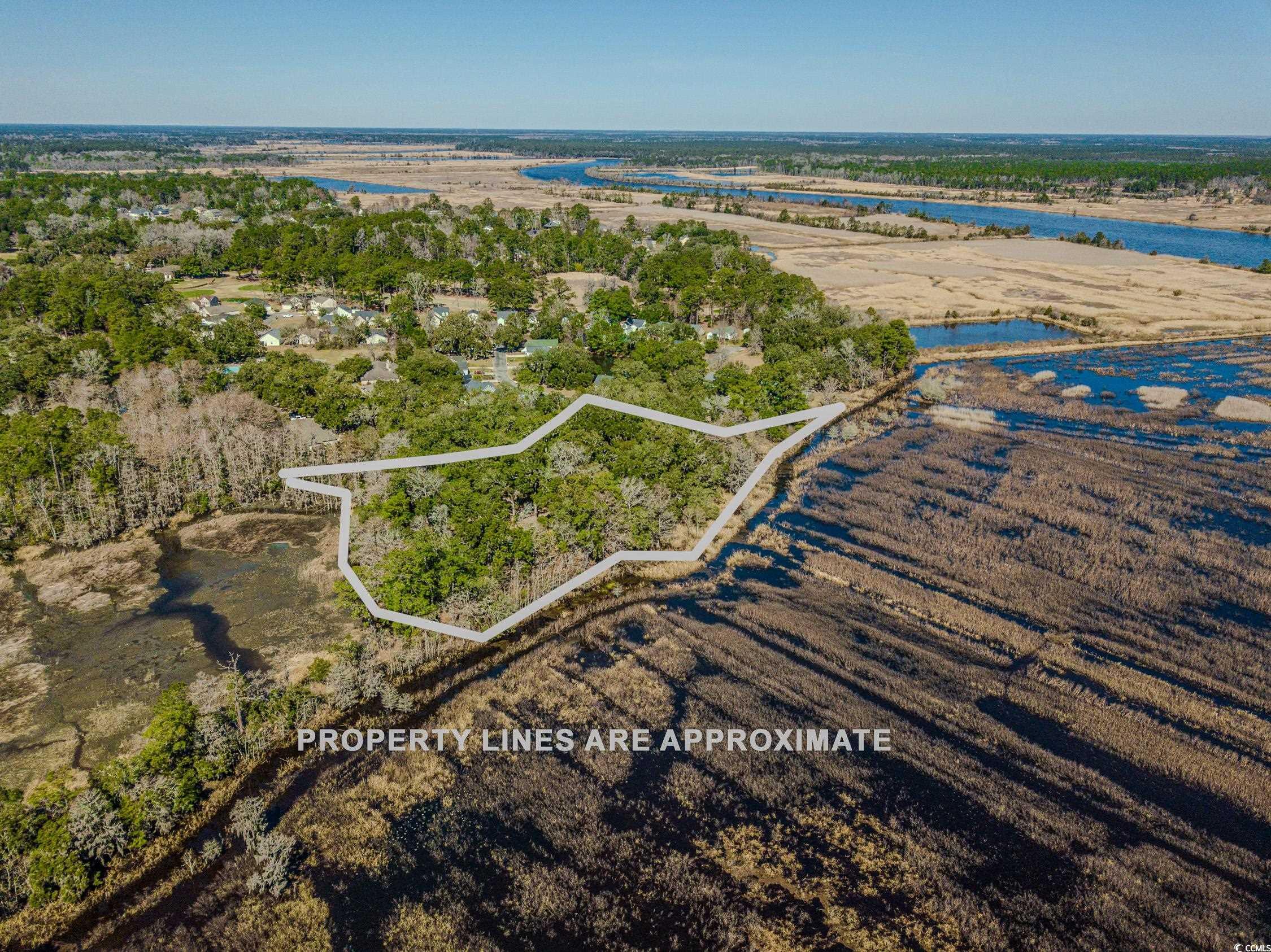 762 Wraggs Ferry Road Georgetown, SC 29440 - Photo 9 of 33 Drone / aerial view with a water view