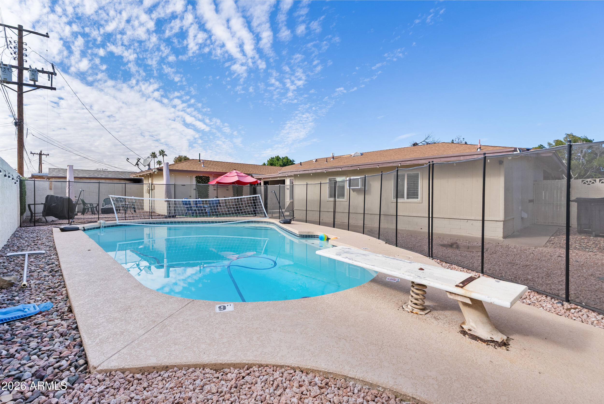 3631 West Colter Street Phoenix, AZ 85019 - Photo 41 of 45 a view of a swimming pool with a patio