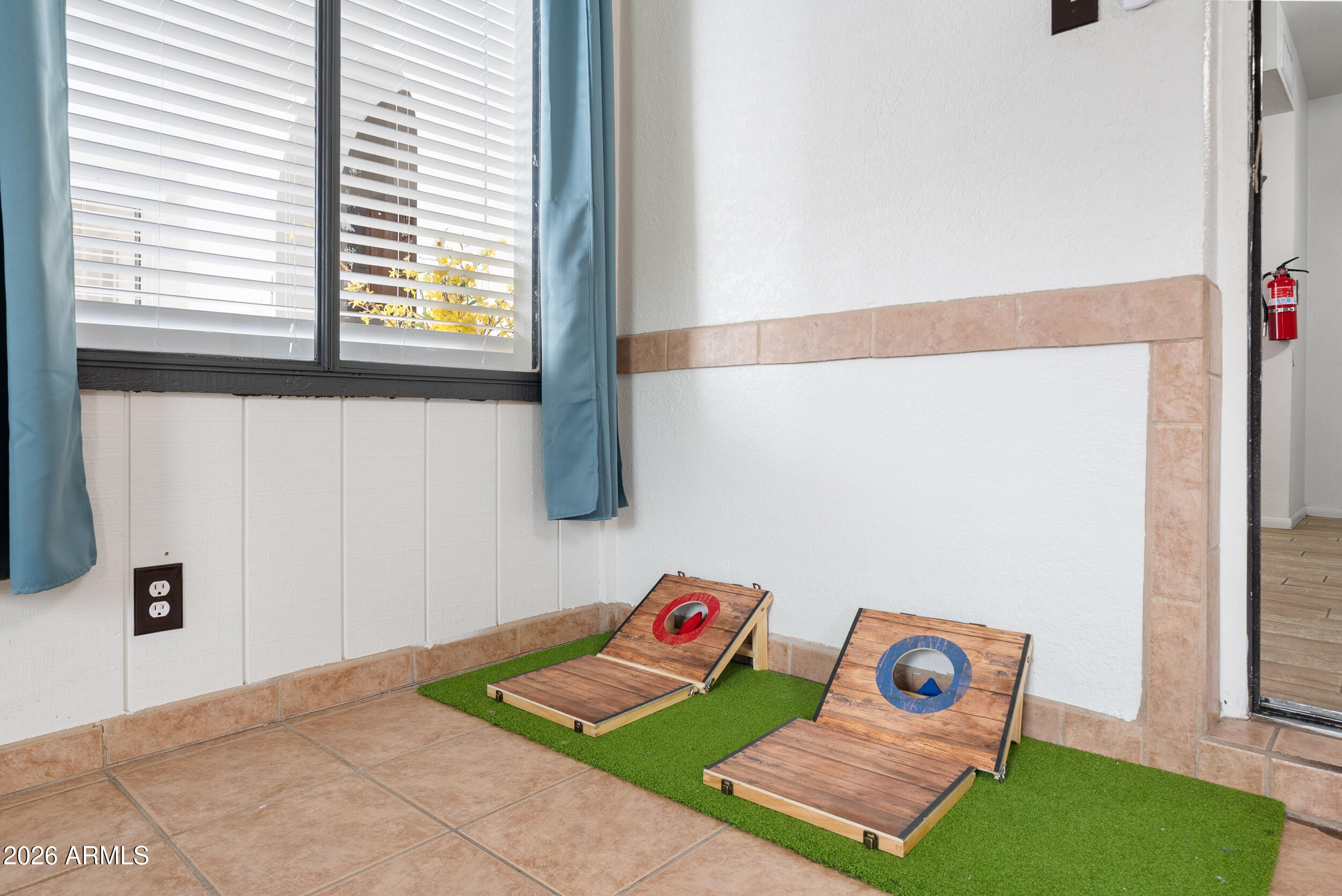 3631 West Colter Street Phoenix, AZ 85019 - Photo 43 of 45 a room with a bed and a window