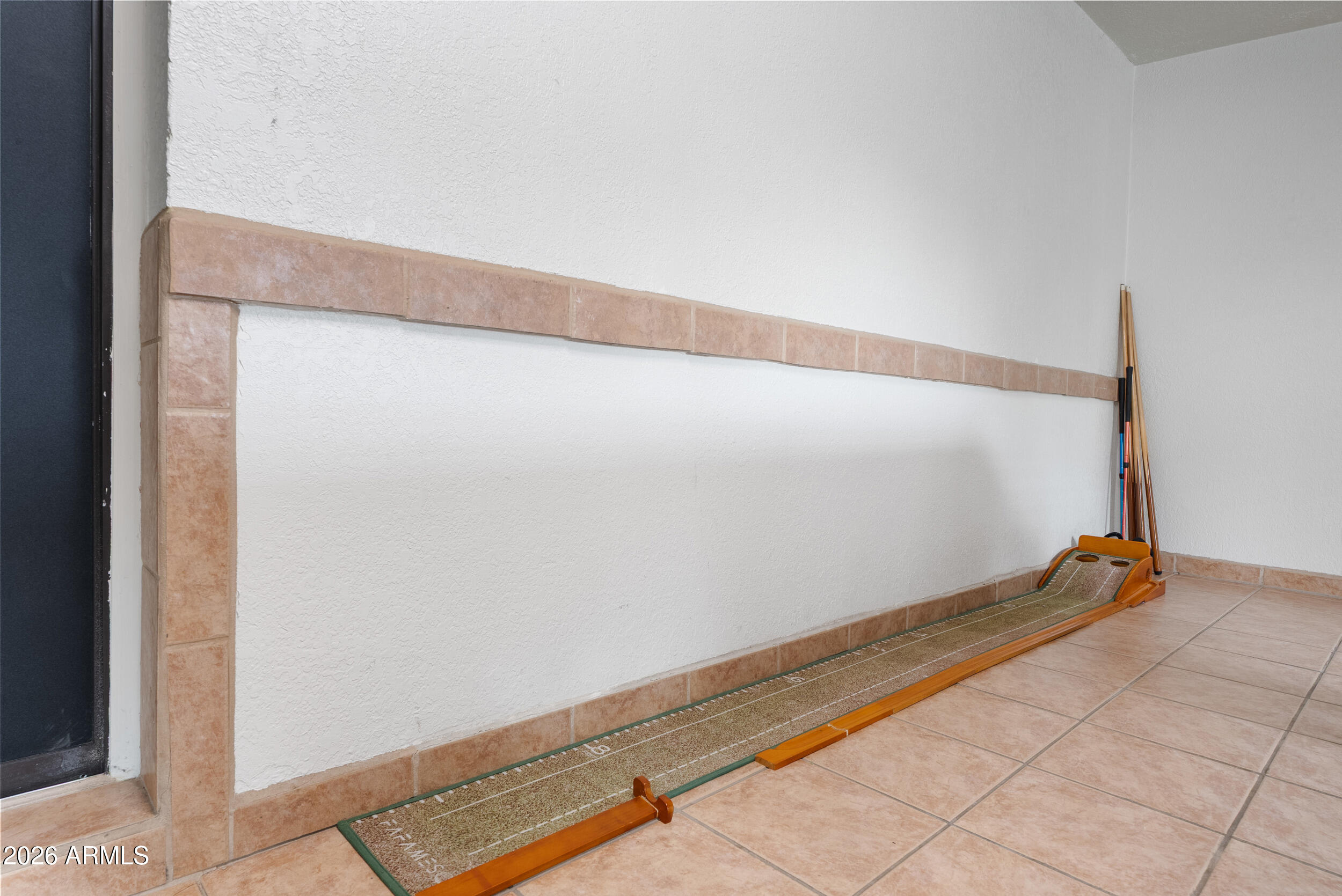 3631 West Colter Street Phoenix, AZ 85019 - Photo 44 of 45 a view of a room with wooden floor