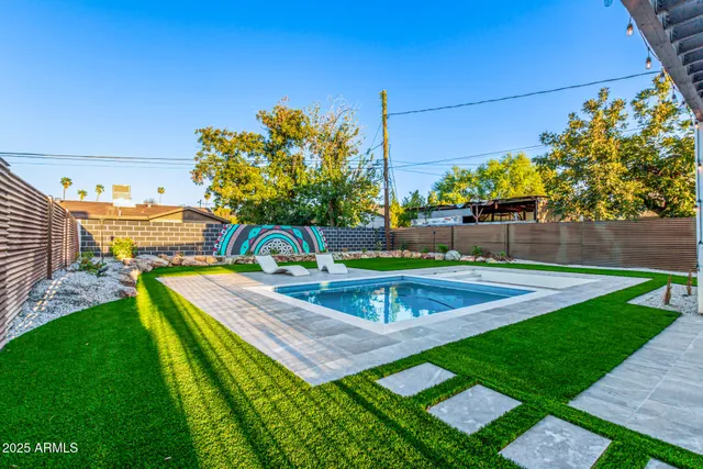 a view of outdoor space yard and swimming pool