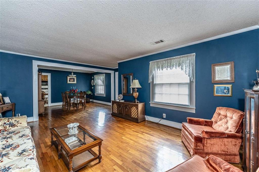 13 Spring Circle Southeast Lindale, GA 30147 - Photo 11 of 25 a living room with furniture and a window