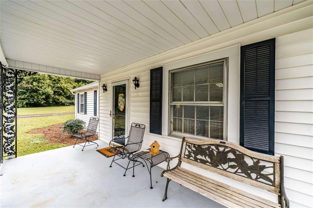 13 Spring Circle Southeast Lindale, GA 30147 - Photo 8 of 25 a building outdoor space with patio furniture