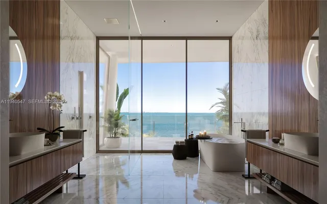 a bathroom with a double vanity sink and mirror